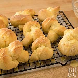 Dating from a recipe that appeared in the 1940s, this sweet citrusy bread dough recipe is tied in tender pretzel-shape rolls. Drizzle glaze from a spoon or squeeze from a bag with a hole snipped in the corner. Serve the rolls for brunch or breakfast. Holiday Ham Dinner, Pretzel Shape, Bread Dough Recipe, Sweet Roll, Breakfast Breads, Bread Rolls, Dough Recipe, Bread Dough, Tortillas