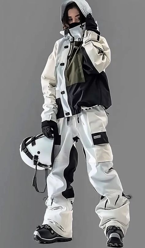 The image shows a person wearing a white and black ski suit. The suit has a jacket and pants. The jacket has a hood and a zipper up the front. The pants have a high waist and a zipper at the bottom of each leg. The person is also wearing a helmet and ski boots. The helmet is white and black, and the ski boots are black. The person is standing on a gray background. Black Ski Outfit, Ski Outfit Men, Cloth Reference, Ski Outfits, Snowboarding Outfit, Ski Suit, Ski Suits, Character Reference, Snowboard Jacket