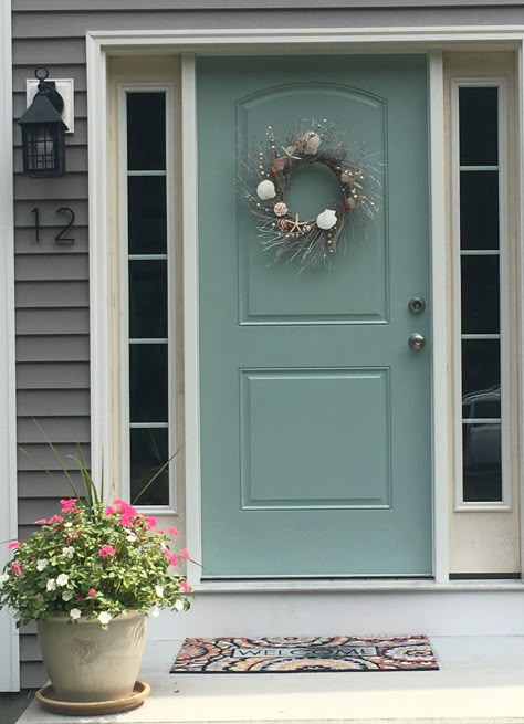 Wythe Blue by Benjamin Moore  This is my front door and it looks so much more soothing and beach. I went from dark gray to this. Two coats of primer helped bring out the true color.  I adore it!! Front Door On Dark Grey House, Front Doors On Dark Gray Houses, Door Colors Brown House, Front Door Paint Ideas For Gray House, Sw Front Door Colors, Sea Foam Green Front Door, Doors On Grey Houses, Best Color For Front Door On Gray House, Pop Of Color Front Door Gray House