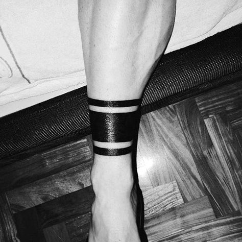 Guys Ankle Band Tattoo Blackwork Deisgns Band Tattoo Meaning, Ankle Tattoo Cover Up, Black Band Tattoo, Ankle Band Tattoo, Ankle Tattoo Men, Leg Band Tattoos, Small Watercolor Tattoo, Band Tattoos For Men, Tattoo Band