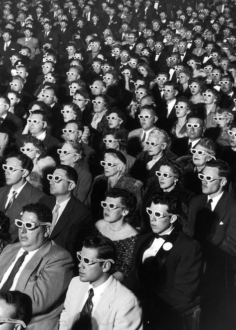 J. R. Eyerman / Getty Images An audience sports 3D glasses during the opening-night screening of Bwana Devil, the first full-length color 3D motion picture, at Paramount Theater in 1952. Plakat Design Inspiration, Grafika Vintage, Life Magazine Covers, 3d Cinema, Paramount Theater, Fotografi Vintage, Foto Vintage, Iconic Photos, Jolie Photo