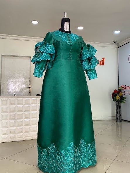 Garbadin fabric is the perfect one on this dress.
Visit for more and don't forget to follow Mikado Styles, Latest Material Gown Styles, Kampala Gown Styles For Ladies, Aline Gown, Senegalese Fashion, Sewing Styles, Materials Gown Style, Emerald Fashion, Bubu Gown