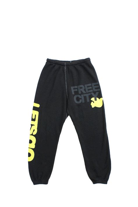 Unisex sweatpant with classic "Free City" print in black and yellow. A supersoft essential sweatpant with a covered elastic waist and a pull drawstring. WHY WE LOVE IT FREECITY, born in 2001, uses local factories with custom developed materials, fabrications, washes and dyes. Prints are hand-thrown, using hand-mixed paint with on-screen mixed gradients - made one by one, in small batches. DETAILS Medium weight polyblend: 50& rayon, 25% polyester, 25% cotton. Hand-sewn, washed, and hand-screen pr Freecity Sweatpants, Free City Sweatpants, Sweatpants Design, Pants Ideas, Graphic Sweatpants, Dream List, Merch Ideas, Free City, Volleyball Outfits