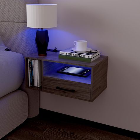 PRICES MAY VARY. NIGHTSTAND WITH LED LIGHTS: The dreamy floating Nightstands Lighting Designs(16 Static Colors,4 Dynamic Modes) brightness can be adjusted,you will always find your favorite light to raise bedroom vibes. It will create a fantastic ambiance in your bedroom in the dark. CONVENIENT CHARGING: The bedside table is equipped with 2 USB ports and 1 AC outlets, making it a breeze to charge your phone, electronics equipment. Concealed wire design prevents cable clutter. A set is always bet Floating Night Stand Ideas, Mens Apartment Decor Masculine Interior, Floating Side Table, Room Decor For Men, Bedside Table With Drawers, Floating Nightstands, Floating Shelf With Drawer, Future Board, Floating Bedside Table