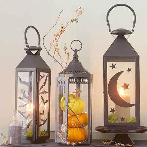 DIY Halloween project.  Attach moon, stars, and bats to lanterns.  Add candle and moss to finish.  In another lantern, add small pumpkins. Halloween & Fall decor. Unique Halloween Crafts, Halloween Lanterns Diy, Fall Lanterns, Halloween Decorations To Make, Halloween Heart, Halloween Printables Free, Easy Halloween Decorations, Diy Halloween Decor, Halloween Lanterns