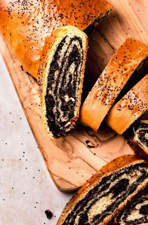 Indulge in the rich flavors of Ukrainian heritage with this delightful poppy seed swirl bread. This traditional treat combines a soft, fluffy dough with a sweet, nutty poppy seed filling, creating a beautiful swirl pattern that is as pleasing to the eye as it is to the palate. Perfect for breakfast, dessert, or a special occasion, this bread brings a touch of Eastern European charm to your table. Enjoy a slice with a cup of tea or coffee for a comforting and satisfying experience. Poppy Seed Roll Recipe, Poppy Seed Roll, Poppy Seed Filling, Swirled Bread, Just Bake, No Knead, Roll Recipe, Sweet Bread, Poppy Seed