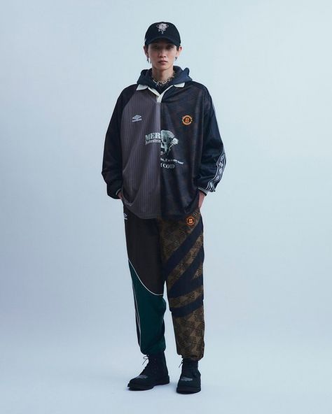 Japanese label @children_of_the_discordance has teamed up with @umbro on a seven-garment collection that channels the sportswear giant’s ‘90s silhouettes. Founded by Hideaki Shikama, the label is known for its sophisticated upcycled garments and vintage-inspired pieces. This latest drop takes cues from Umbro’s ‘90s football apparel, particularly the Eric Cantona-era Manchester United teams. The collection features split-designed tops and bottoms, combining technical fabrics with denim, cable ... Upcycled Garments, 90s Football, Football Apparel, Manchester United Team, Eric Cantona, Tops And Bottoms, Vintage Sportswear, Football Outfits, Style Guide