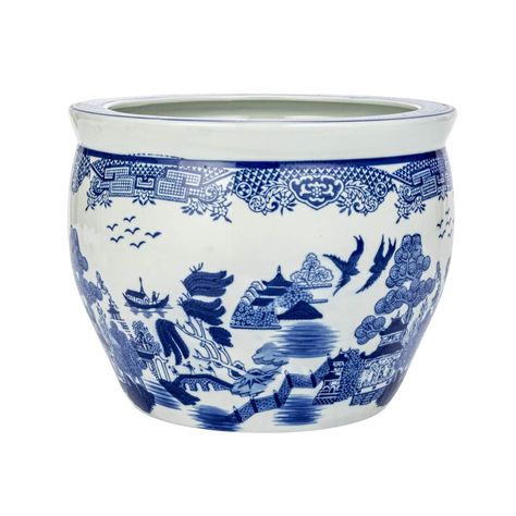 "Shop the 12.25\" Blue & White Hand-Painted Stoneware Planter at Michaels. com. This beautiful planter is made of high-quality stoneware that has a hand-painted blue and white design that creates a striking contrast and a lively look. Add some charm and elegance to the space with this hand-painted stoneware planter. This beautiful planter is made of high-quality stoneware that has a hand-painted blue and white design that creates a striking contrast and a lively look. The design features floral Chinoiserie Planter, Blue Willow China, Blue And White Design, Coastal Boho, Pumpkin Farm, Table Shelf, White Planters, Botanical Collection, Creative Co Op