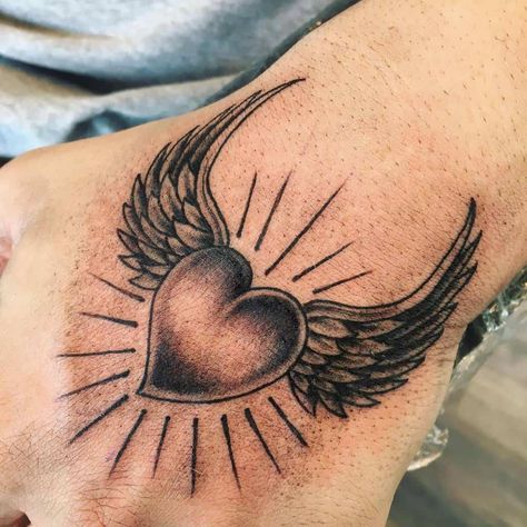 Heart Angel Wings Tattoo, Heart Shaped Angel Wing Tattoo, Heart And Wings Tattoo, Heart Wings Tattoo, Wings Tattoo Meaning, Heart With Wings Tattoo, Memorial Tattoo Designs, Flying Heart, Angel Tattoos