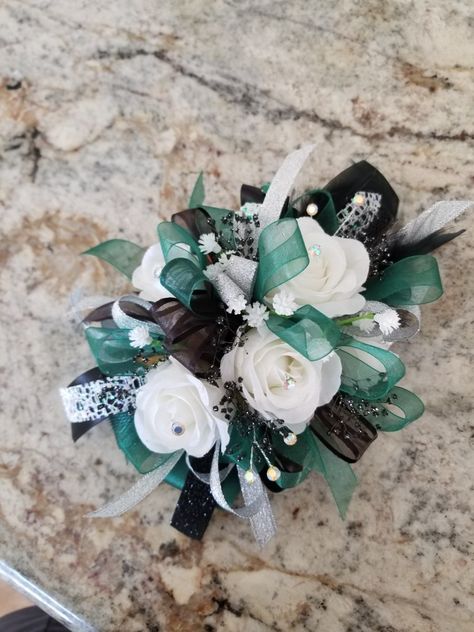 Jade Green Corsage, Emerald Green Homecoming Flowers, Emerald Green Prom Corsage, Black And Green Corsage, Emerald Green Prom Flowers, Emerald Green Corsage And Boutonniere, Corsage For Green Dress, Dark Green Corsage, Green Prom Corsage