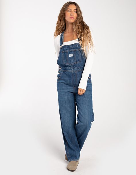 Levi's No Hippies Vintage Overalls. Made From A Durable Cotton-Rich Fabric, These Vintage-Inspired Overalls Have All The Familiar Features You Love Creating An Authentic Look From Top To Bottom. Better With Age And Wear, This Classic Workwear Essential Has Already Become Our Closet Staple To Transition Through The Seasons. Adjustable Straps. Multiple Pockets For Storage. Relaxed Through Your Hip And Thigh. Approx. Inseam: 28''. 100% Cotton. Machine Wash. Imported. Model Is Wearing A Size Small. Levi Overalls Outfit, Flare Overalls Outfit, Levis Overalls Outfit, Overalls Women Outfits, Gaby Core, Overall Fall Outfits, Women Overalls Outfits, Long Overalls Outfit, Overalls Outfit Ideas