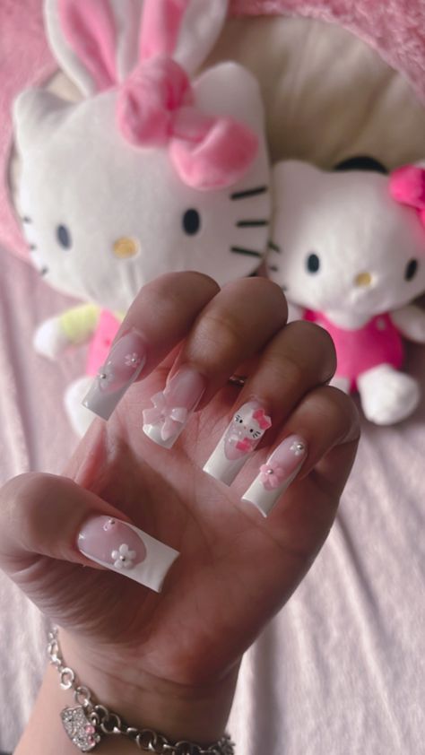 Light Pink Hello Kitty Nails, French Tip With Hello Kitty Charm, Hello Kitty Coquette Nails, Small Hello Kitty Nails, Hello Kitty Simple Nails, Kid Nails Acrylic, Hello Kitty Nails Medium Length, Hello Kitty Summer Nails, Basic Hello Kitty Nails