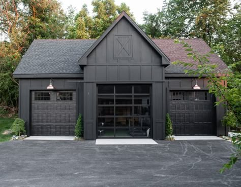 Sherwin Williams Tricorn Black Modern Farmhouse Detached Garage painted in Sherwin Williams Tricorn Black Sherwin Williams Tricorn Black Modern Farmhouse Detached Garage painted in Sherwin Williams Tricorn Black Sherwin Williams Tricorn Black Modern Farmhouse Detached Garage painted in Sherwin Williams Tricorn Black #SherwinWilliamsTricornBlack #ModernFarmhouse #DetachedGarage #SherwinWilliams Black Garage White House, Black Exterior Garage, Black Houses Modern, Modern Farmhouse Detached Garage, Modern French Country Cottage, Black Sherwin Williams, Sw Tricorn Black, Sherwin Williams Tricorn Black, Exterior Molding