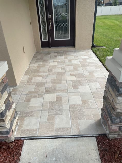 Daves Custom Flooring outdoor tile job on a front porch. Florida Outdoor Entry Tile Ideas, Front Yard Tiles Ideas, Front Porch Tiles Entrance, Tiles For Porch Floor, Tiles For Veranda, Front Porch Tile Over Concrete, Tile On Front Porch, Tiled Porch Floor Entrance, Lanai Flooring Ideas