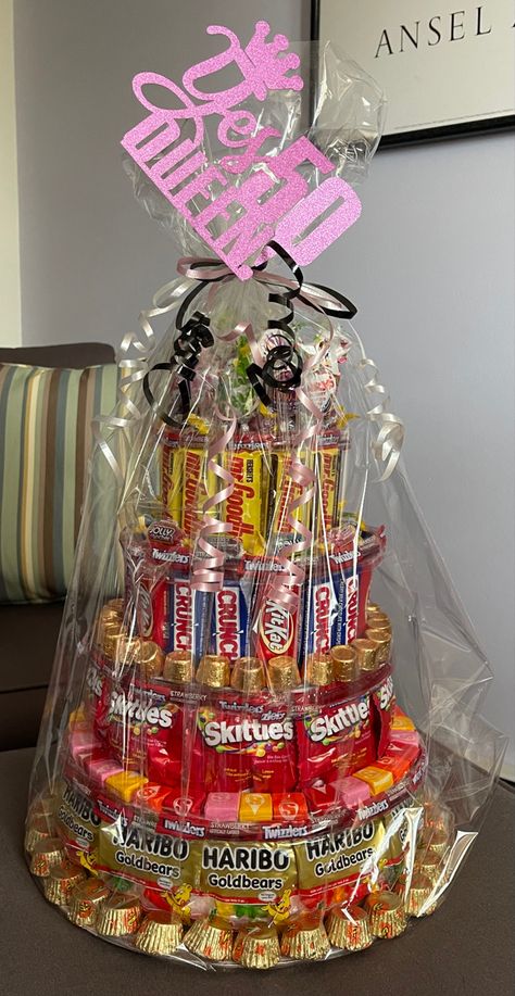 Candy Tower Cake, Candy Tower Ideas, Candy Basket Ideas Birthday, Bingo Prizes, Candy Tower, Birthday Present Cake, Snack Tower, Candy Bar Gifts, Race Night