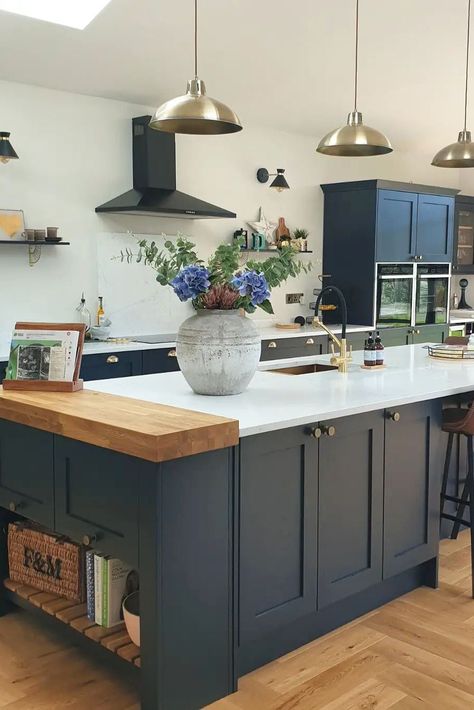 In need of blue kitchen inspiration or shaker kitchen inspiration? @home_at_51's Chilcomb Navy Kitchen is perfect for your blue kitchen ideas and traditional kitchen ideas. The white quartz worktop, solid oak worktop block and aged brass hardware are perfect for creating a traditional kitchen design. Add your favourite home decor, a black and brass kitchen tap and oak herringbone flooring to create a rustic kitchen design with a modern kitchen design twist. Kitchen Herringbone Floor, Blue Kitchen Interior, Blue Shaker Kitchen, Kitchen Diner Extension, Navy Kitchen, Open Plan Kitchen Dining Living, Open Plan Kitchen Diner, Open Plan Kitchen Dining, Fortnum Mason