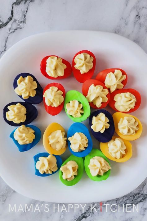 Today I am going to show you how to make colored deviled eggs for Easter. These eggs came out absolutely gorgeous! They are also really easy to make. If you don’t want to use my deviled egg recipe, you can substitute your own. The secret is in how much food coloring to use for each egg set. But don’t worry, I have the exact drop measurements you need to make a rainbow of Easter egg colors. I gave my eggs bold colors (instead of a more pastel palette) because I wanted them to pop on the plate. Deviled Eggs For Easter, Colored Deviled Eggs, Egg Colors, Deviled Egg Recipe, Easter Deviled Eggs, Eggs For Easter, Make A Rainbow, Easter Appetizers, Spicy Seasoning