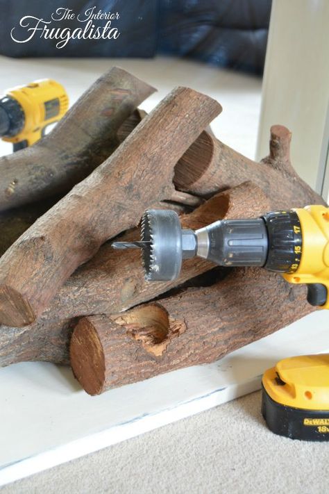 Drilling Holes For Faux Fireplace Insert | The Interior Frugalista Faux Fireplace Insert, Log Candle Holders Diy, Faux Foyer, Faux Fireplace Mantels, Fake Fireplace, Gorgeous Fireplaces, Faux Fireplace Diy, Log Candles, Candles In Fireplace