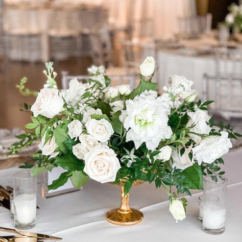 Romantic lush weddings start with a romantic love story. This wedding took place at the beautiful Newhall Mansion located in Piru, CA. Our floral design team successfully executed our clients vision of a lush wedding aesthetic. The wedding palette was sophisticated and elegant with a mix of all white flowers and lush greenery. Head on over to our blog to learn more about featured bouquets, centerpieces, ceremony arrangements, arch installs, and more! White Flowers Sweetheart Table Wedding, Elegant White And Green Wedding, Green Wedding Centerpieces, Beaulieu Garden, Homestead Wedding, White And Green Wedding, Luxury Florists, Lush Wedding, Green Wedding Flowers