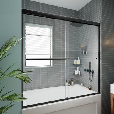 Upgrade your bathroom with our Bathtub Shower Door, featuring durable tempered glass that is resistant to breaking. With its unique handle design, this shower door doubles as a convenient towel bar, adding functionality to your bathing space. Rest assured, the product has undergone SGCC certification, ensuring both quality and safety. ExBrite Finish: Matte Black | ExBrite 56" - 60" W x 58" H Double Sliding Semi-Frameless Tub Door w / Clear Glass 58.0 H x 60.0 W x 0.24 D in blackTempered Glass in Glass Shower Tub, Tub With Glass Door, Bathtub Shower Door, Shower Bath Combo, Frameless Sliding Doors, Bathtub Shower Doors, Tub Door, Tub Doors, Bathtub Shower