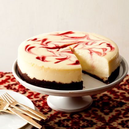 Raspberry Swirl Cheesecake | Savor all the rich flavor of cheesecake but with less fat and calories as in this lightened verson of Raspberry Swirl Cheesecake. Pineapple Cheesecake, Raspberry Swirl Cheesecake, Swirl Cheesecake, Low Fat Cheese, Chocolate Graham Crackers, Classic Cheesecake, Raspberry Cheesecake, Cheesecake Factory, Cheesecake Recipe