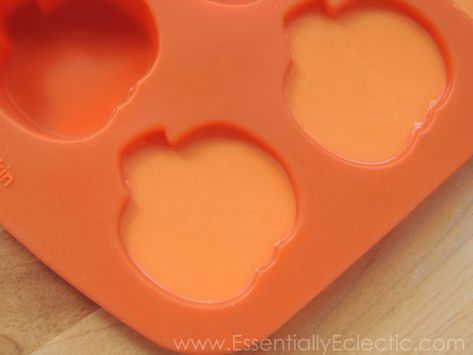 Learn how to make cute Halloween-themed soaps for gifts or party favors! These pumpkin and skull soap bars are sure to be a hit! | DIY Bath and Body | Soap Making | Melt and Pour Soap | Halloween Soap | How to make soap without lye | Mom Makes Joy Soap Without Lye, How To Make Soap, Pumpkin Mold, Diy Soap Bars, Soap Embeds, Pumpkin Soap, Halloween Soap, Orange Soap, Make Soap