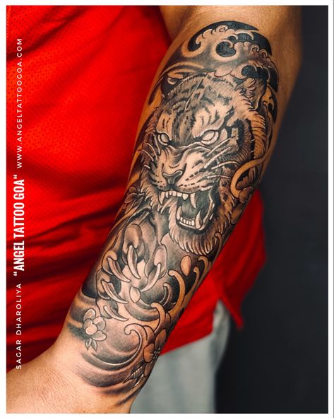 Tiger Tattoo By Sagar Dharoliya Angel Tattoo Goa - Best Tattoo Artist in Goa - Best Tattoo Studio in Goa - Best Tattoo Artist & Studio in Baga Goa Asian Inspired Tattoos Men, Men’s Chest And Arm Tattoos, Japanese Tiger Tattoo Back, Chinese Tiger Tattoo Men, Vietnamese Tiger Tattoo, Japanese Tiger Forearm Tattoo, Japanese Clouds Tattoos, Asian Tiger Tattoo Japanese Style, Asian Sleeve Tattoos For Guys