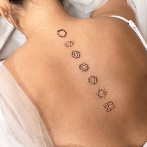 Young Talent Expresses His Artistic Side Through Minimalist Tattoos Chakras On Back Tattoo, Dainty Chakra Tattoo, Chakra Line Tattoo, Tattoo Ideas Female Chakra, Chakra Tattoo Minimalist, Fine Line Chakra Tattoo, Minimalist Chakra Tattoo, Back Chakra Tattoo, Seven Chakra Tattoo