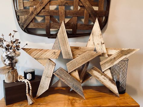 Add a rustic touch to your home with our 30-inch wooden star, crafted from beautifully distressed wood. Whether you prefer is stained for a rich, warm finish or left natural for a more rustic look, this star is a perfect statement piece for any space. Hang it indoors or out for a charming, farmhouse-inspired accent!  Note: This item can be customized with laser engravings. The engravings will be placed on the arms of the star, allowing you to add a personal touch to this beautiful piece. Rustic Wood Star, Wood Stars Diy Rustic, Christmas Decor Wood Diy, Wood Church Craft, Wood Stars Diy Rustic Christmas Decor, Wood Holiday Decor, Scrap Wood Ornaments, Woodworking Decorations, 4x4 Wood Projects