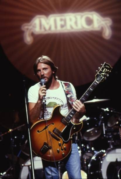 Rock and roll band 'America' featuring Dewey Bunnell perform on 'Midnight Special' TV show in October 1980 in Los Angeles California Dewey Bunnell, Gerry Beckley, Ventura Highway, Rock Band Photos, America Band, Midnight Special, Grunge Vibes, Radio Play, 70s Music