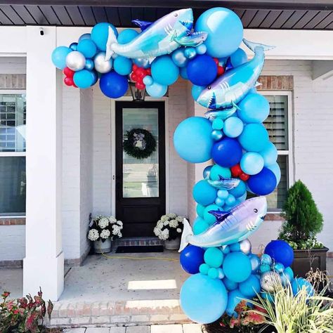 28 Shark Party Ideas for Kids - Lady Celebrations Red Balloon Arch, Shark Balloons, Shark Balloon, Shark Party Decorations, Shark Themed Party, Ocean Birthday Party, Shark Themed Birthday Party, Ocean Birthday, Shark Birthday Party