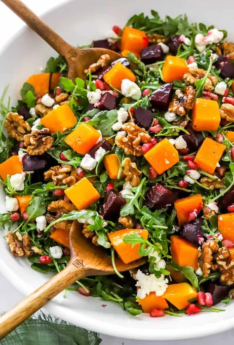 Spicy arugula, roasted beets and butternut squash mixed with crunchy walnuts, and creamy goat cheese. All drizzled with an incredible Orange Vinaigrette dressing! Simple lunch recipe, dinner salad or quick pick me up for those cold winter days. #beets #butternutsqaush #healthysaladrecipes Beet And Butternut Salad, Substantial Salads, Beets And Butternut Squash, Butternut Squash Salad Recipes, Quinoa Salad Recipes Healthy, Orange Vinaigrette Dressing, Butternut Squash Recipes Healthy, Cheese Salad Recipes, Dressing Simple