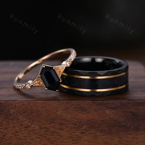 Here we have a Antique Black Onyx Couples Ring Yellow Gold Matching Ring Set His and Hers Wedding Band Mens Black Sandstone Ring Promise Ring For Couples. ITEM DESCRIPTION ✦ Handmade, high-quality item! ✦ Material: Sterling Silver/Tungsten ►Sold as a two-piece set ►His ring is Yellow Gold and Black Tungsten Carbide with black sandstone inlay. ►His band width: 8mm ►His tungsten ring will not turn green itself and will not cause your skin to turn green.  ✦ Durable - Incredibly Scratch-Resistant to Mens Black Engagement Rings, Black Mens Rings, Marry Rings Couples, Matching Promise Rings Gold, Black Onyx Wedding Set, Man Promise Ring, Wedding Ring Ideas Couple, Goth Wedding Ring Set, Couples Rings Matching