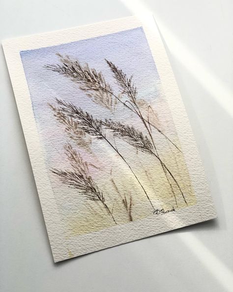 Watercolor of grass against the backdrop of a setting sun - a play of gentle shades of yellow and blue, depicting the serene evening atmosphere. Bedroom wall art, claming home decor, clam and cozy accent #decohome #decor #forsale #clam #watercolor #painting #natural #botanical #boho #malowanie #akwarela #natura Watercolour Art, Setting Sun, Yellow And Blue, Shades Of Yellow, Bedroom Wall Art, Bedroom Wall, Watercolor Painting, Watercolor Art, Shades