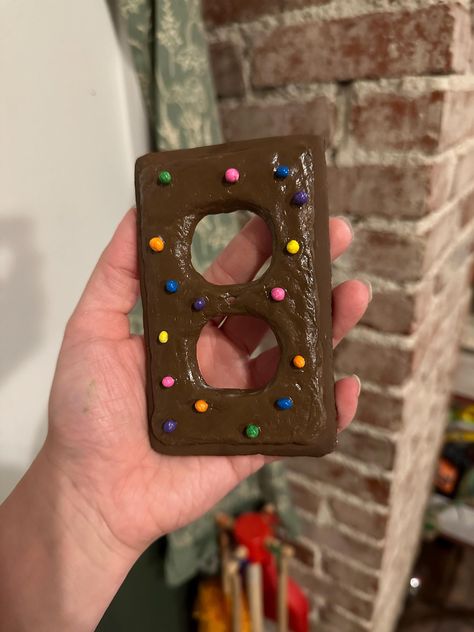 Add some fun to your home with these cosmic brownie lightswitch or outlet covers! Diy Outlet Covers, Light Switch Covers Diy, Dorm Room Crafts, Cosmic Brownies, Outlet Plug, Pastel Home Decor, Switch Socket, Pinterest Diy Crafts, Room Redesign