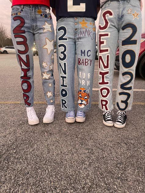 Class Of 2024 Senior Pants, Jeans For Senior Year, Senior Crewneck Ideas Diy, Senior Sunrise Pants Ideas, Senior Year Jeans 2024, Painting Jeans For Seniors, Senior Spirit Day Jeans, Senior Shirts 2024 Diy, Spirit School Ideas