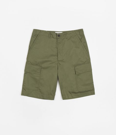 Universal Works MW Cargo Shorts in Olive. Crafted from 100% cotton and tailored to a loose fitting, these knee-length Universal Works shorts are workwear inspired with a classic belt loop waist. Featuring a single button secured zipper fly, these olive green cargo shorts are finished with two side pockets, two rear pockets and two additional cargo pockets sewn above each cuff. Supported by their recent collaboration with Novesta and by their ‘No Border, No Nations, Just People’ film, Universal W Green Cargo Shorts, Classic Belt, Green Cargo, Universal Works, My Photo Gallery, South West, Cotton Tops, Cargo Shorts, Olive Green