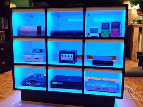 LED lit up console gaming shelves via mikeyfids on Instructables. Organized game systems in colorful light displays.: Video Game Console Shelf, Game Console Shelf, Gaming Shelf, Sala Gamer, Video Game Organization, Deco Gamer, Gaming Stand, Display Collections, Video Game Storage