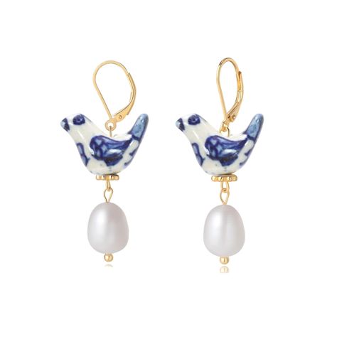 PRICES MAY VARY. Unique Bird Design: Embrace the beauty of nature with our handcrafted bird earrings for women, featuring an exquisite blue and white porcelain ceramic bird that adds a touch of whimsy to your look. Perfect for those who appreciate bohemian and vintage styles. Premium Craftsmanship: Meticulously made with attention to detail, these bird earrings boast a secure gold leverback closure, ensuring they stay comfortably in place all day. The dainty design adds to their delicate charm. Blue China Earrings, Ethereal Earrings, Blue And White Jewelry, Blueberry Earrings, Dream Earrings, Blue And White Earrings, Bird Accessories, Vintage Earring, Quirky Earrings