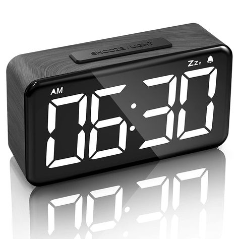 PRICES MAY VARY. Easy Use: This basic function alarm clock with intuitive setting buttons, simple to set the time and alarm, great for kids, adults, seniors and the elderly. 9-MIN SNOOZE: Big snooze button on the top of the bedroom clock, just hold out your hand then beat the alarm clock, you will enjoy extra 9 minutes sleep. The LED digital clock with 6 inch LED display screen and large number allows to read the time easily even for impaired vision people, 6 levels brightness from dim to bright Simple Alarm Clock, Modern Alarm Clock, Alarm Clock Digital, Clock For Bedroom, Bedroom Clocks, Clock Digital, Clock Alarm, Bedside Desk, Desk Alarm Clock