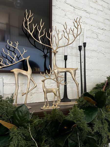 Deer Mantle Decor, Christmas Decor With Candlesticks, Reindeer Mantle Decor, Gold Deer Christmas Decor, Reindeer On Mantle, Gold Reindeer Christmas Decor, Decorating With Reindeer For Christmas, Black Reindeer Christmas Decor, Stockings On Wall