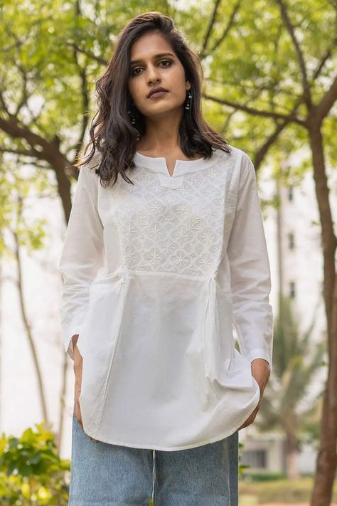 Shop for Sufia White Cambric Cotton Chikankari Zoey Short Tunic for Women Online at Aza Fashions Tunic Tops With Jeans Stylists, Short Kurtis For Jeans, Skirts For Fall, Latest Traditional Dresses, Formal Suits For Women, Short Kurti Designs, Simple Indian Suits, Kurti With Jeans, Long Gown Design