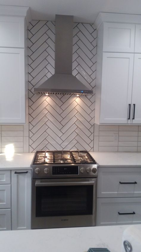 Herringbone Over Stove, Herringbone Kitchen Tile Backsplash, Kitchen With Herringbone Backsplash, Tile Backsplash Kitchen Herringbone, Herringbone Backsplash Behind Stove, Grey Herringbone Backsplash, Kitchen Herringbone Backsplash, Herringbone Tile Kitchen, Herringbone Subway Tile Backsplash