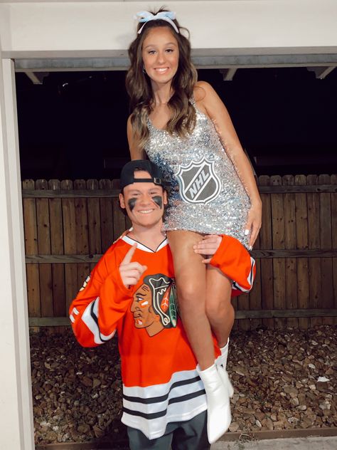 Nhl And Trophy Costume, Hockey Player And Puck Bunny Costume, Sports Trophy Costume, Sport Couple Costumes, Football Couple Costume, Hockey Player And Trophy Costume, Hockey Halloween Costume Couple, Stanley Cup And Hockey Player Costume, Couple Halloween Costumes Hockey