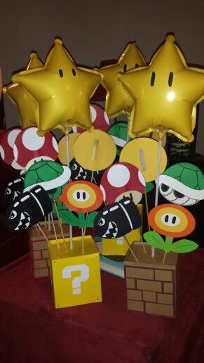 Super Mario Party Table Ideas, Mario Brother Centerpieces, Diy Mario Centerpieces, Mario Brothers Centerpieces, Mario Party Centerpieces Ideas, Princess Peach Birthday Party Centerpiece, Mario Mushroom Diy, Mario Table Centerpiece, Mario Kart Centerpiece Party Ideas