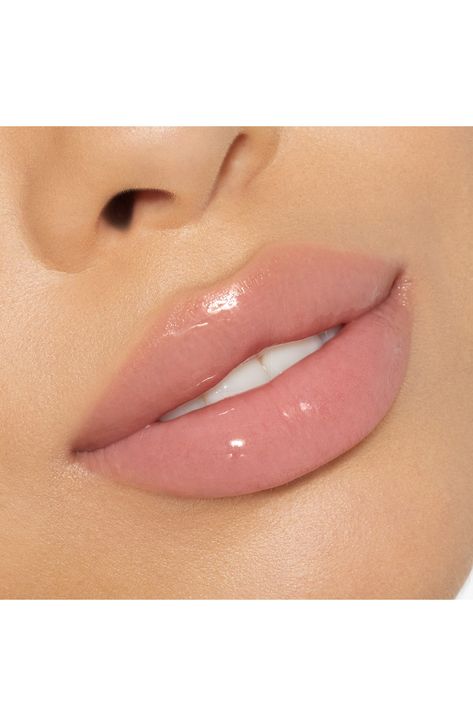 What it is: A lip gloss that offers multidimensional shine and color.What it does: It glides on easily and leaves lips looking luminous and glossy without any stickiness. How to use: Apply directly onto your lips. Wear alone or over lipstick. 0.11 oz. Paraben-free; sulfate-free; gluten-free Cruelty-free Vegan Made in the USA Soft Pink Lipstick Makeup, Light Pink Gloss, Wedding Lip Combo, Light Pink Lip Combo, Ingenue Archetype, Tinkerbell Makeup, Bride Lipstick, Baby Pink Lipstick, Lips Looks