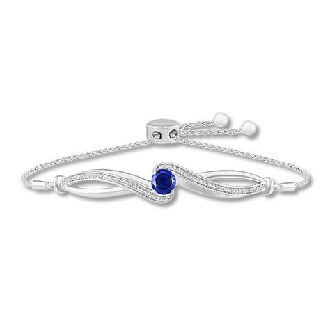 Sweet and on-trend chic, this shimmering bolo bracelet is a must-have accessory. The infinity-inspired center features a brilliant round-cut blue lab-created sapphire amidst sweeps of glittering white lab-created sapphires. Styled in sterling silver, the adjustable wheat chain secures with a bolo clasp. Bolo Bracelet, White Lab, Rose Ring, Bracelet Sterling Silver, Sterling Silver Bracelets, Sapphire Ring, Round Cut, Wheat, Apparel Accessories