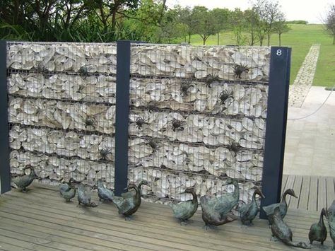 Oyster shell walls are made of abandoned oyster shells collected from oyster farms in Lau Fau Shan. Oyster Shell Fire Pit, Oyster Shell Landscaping, Tabby Concrete, Oyster Wall, Gabion Wall, Cottage Retreat, House Yard, Coastal Life, Fence Decor