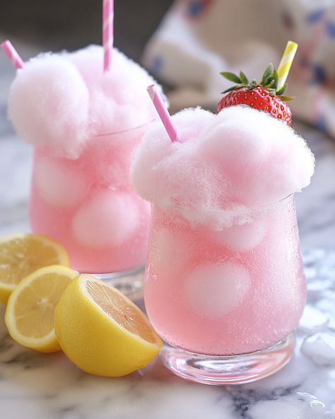 1.5 oz Vodka, 0.5 oz Raspberry Liqueur, 1 oz Fresh Lemon Juice, 2 oz Cotton Candy, 2 oz Soda Water  Have you ever tasted a cocktail that brings back childhood memories? Share your sweetest cocktail experiences with us! #CandyFlossAndChill #NostalgiaInAGlass Candy Floss Cocktail, Pink Mixed Drinks, Cotton Candy Cocktail, Scrumptious Food, Raspberry Liqueur, Sweet Cocktails, Soda Water, Frozen Cocktails, Candy Floss