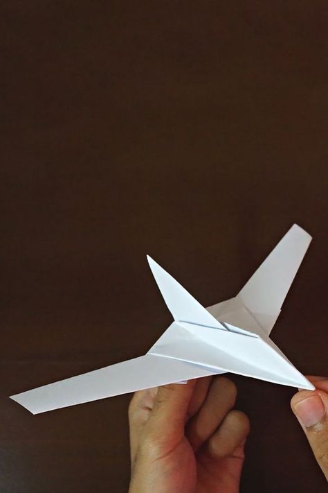 This video will show how to make an easy paper fighter jet airplane that fly far. To make this Origami airplane watch full video and follow the instructions that i show step by step. Beginners can make this simple paper jet plane with easily. So i hope this video tutorial will help you to make an origami plane out of colors paper. #origamijet #papertoyplane #paperplane Paper Airplane Steps, Paper Airplanes Instructions, Paper Jet, Best Paper Plane, Plane Crafts, Origami Plane, Origami Airplane, Paper Airplane Models, Make A Paper Airplane